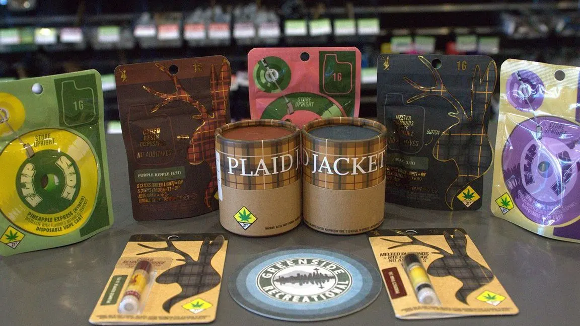 Assorted Plaid Jacket cannabis products displayed on a counter