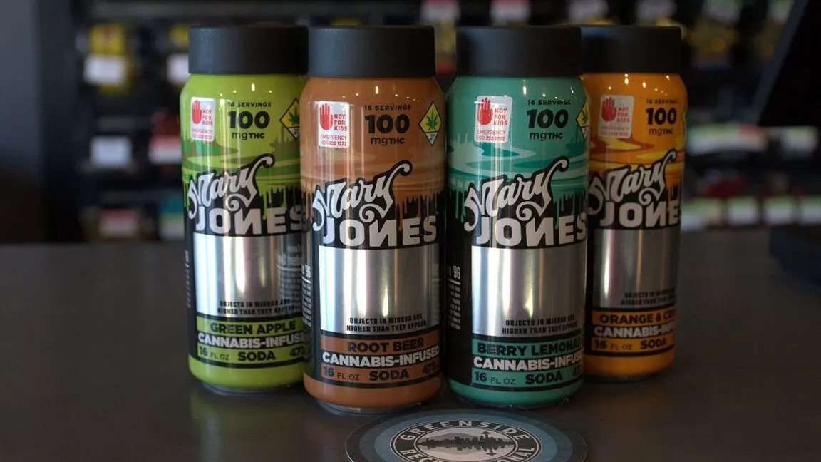 Four cans of Stars Jones cannabis-infused soda on a counter